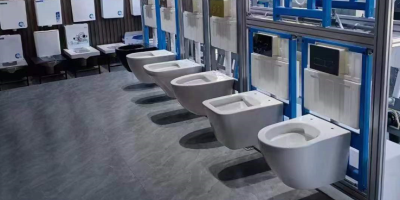 Why are wall hung toilets with hidden tanks popular in Europe?