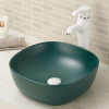 Vitreous china bathroom vessel sink without overflow