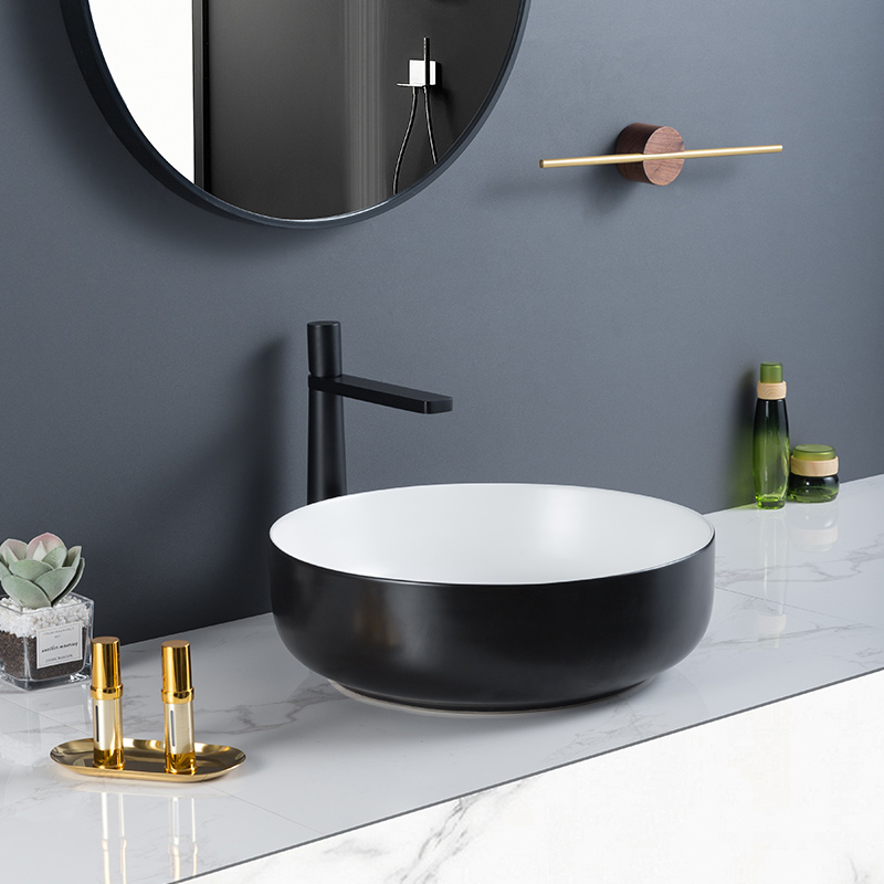 Ceramic Material Black And White Wash Basin With Clean And Smooth Contour Lines