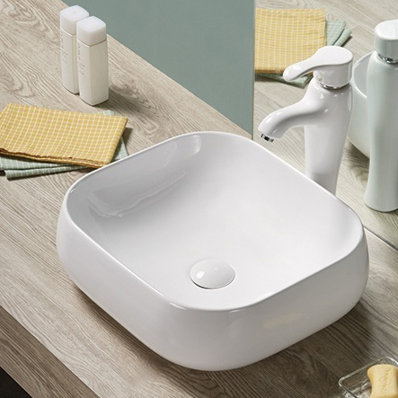 vanity-top-white-color-hand-wash-basin-on-table